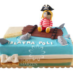 Tort z figurką piratki na tratwie z rekinami dla dziewczynki