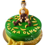 Tort z figurkami ciekawskiego Georga i pana w zółtym kapeluszu